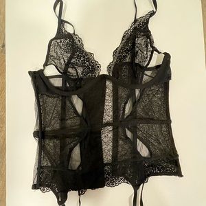 Brand New never opened Victoria Secret corset and matching underwear.